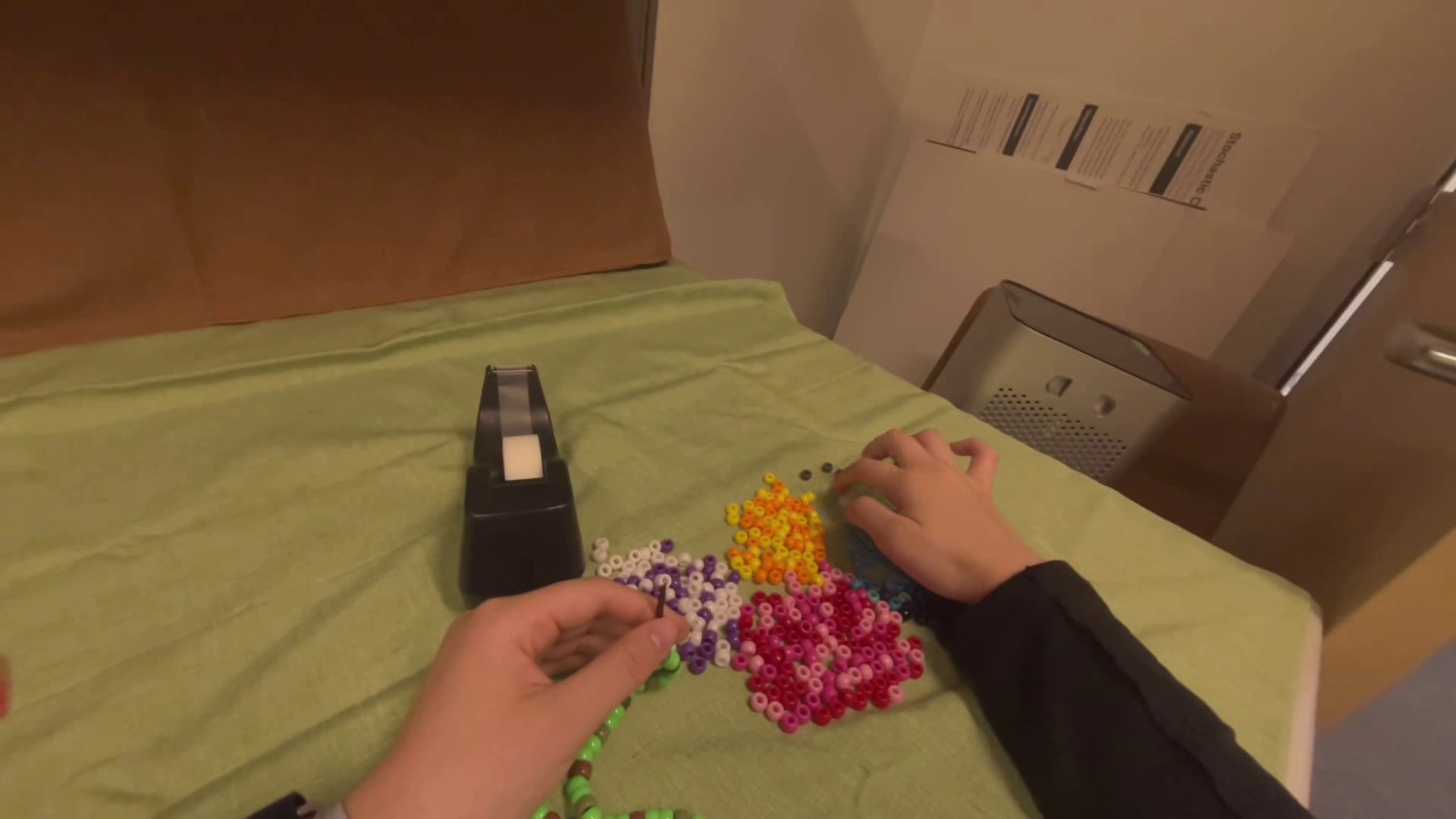 Clean RGB frame of the EgoDex bead necklace interaction